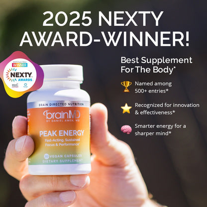 Person holding Peak Energy ATP bottle next to a list of benefits